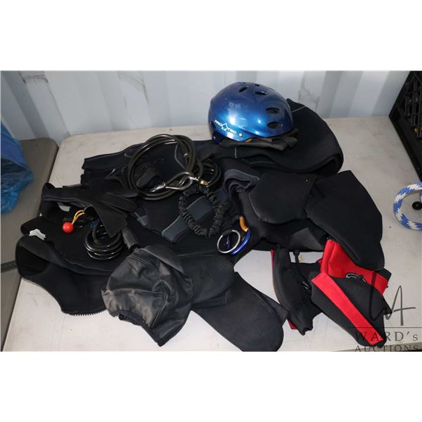 A selection of kayaking gear including a Pro Tec XL Helmet, 2 large wetsuits and assorted other equi