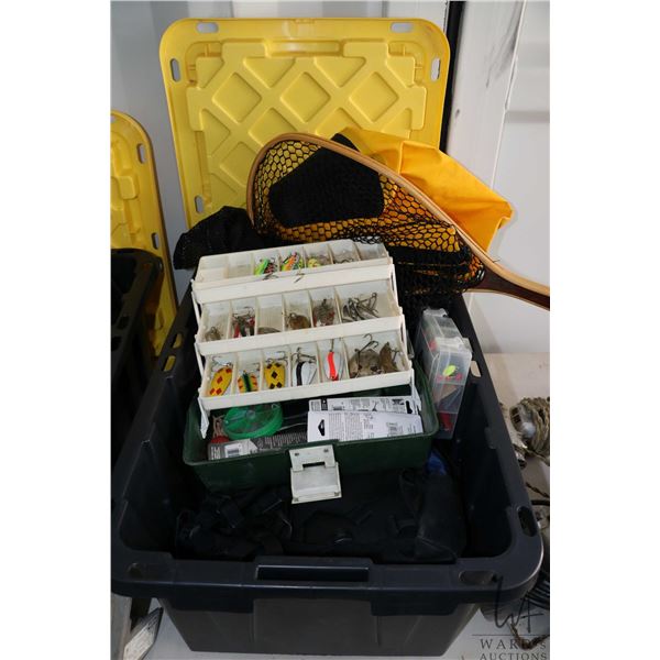A selection of fishing supplies including green tacklebox with lures and weights, small case with ad