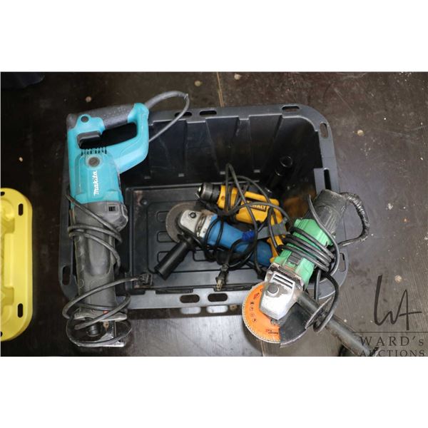 Small selection of power tools including Makita corded reciprocating saw, two 4" corded grinders, an