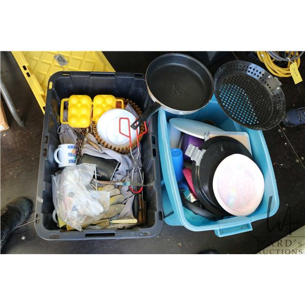 Large selection of camping supplies including pots and pans, dishes, cutlery, and other cooking rela