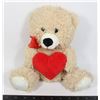 Image 1 : BROWN TEDDY BEAR WITH A RED BOW HOLDING A BIG RED
