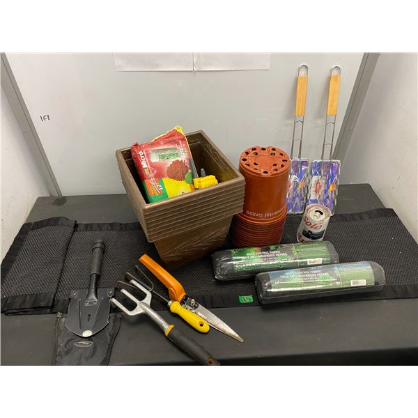 Lot of gardening tools and pots