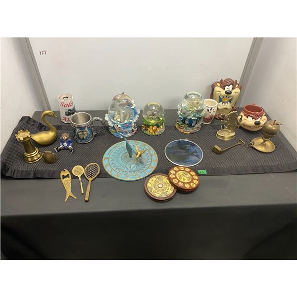 Assorted lot of home décor items including snow globes and brass items