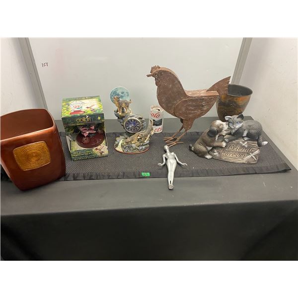 Assorted home décor items including desk clock, ornaments and more