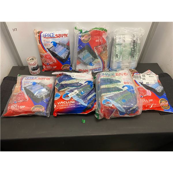 Lot of 7 travel roll up storage bags for space saving while travelling
