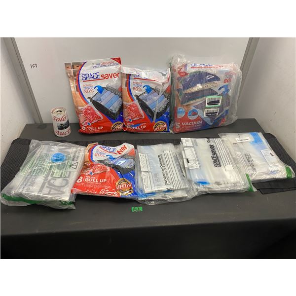 Lot of 8 travel roll up storage bags for space saving while travelling