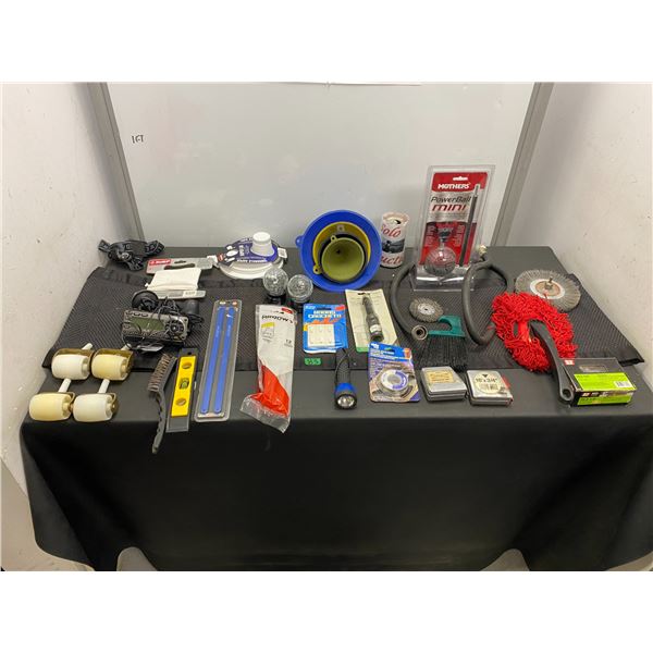 Lot of household items including tape measures, flashlight, funnels and more