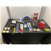 Image 1 : Lot of household items including tape measures, flashlight, funnels and more