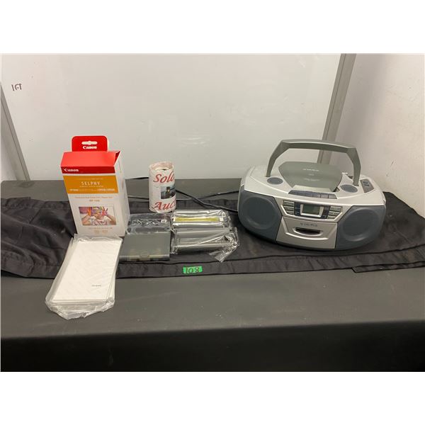 Audio Vox ghetto blaster, and Canon Selphy printer ink
