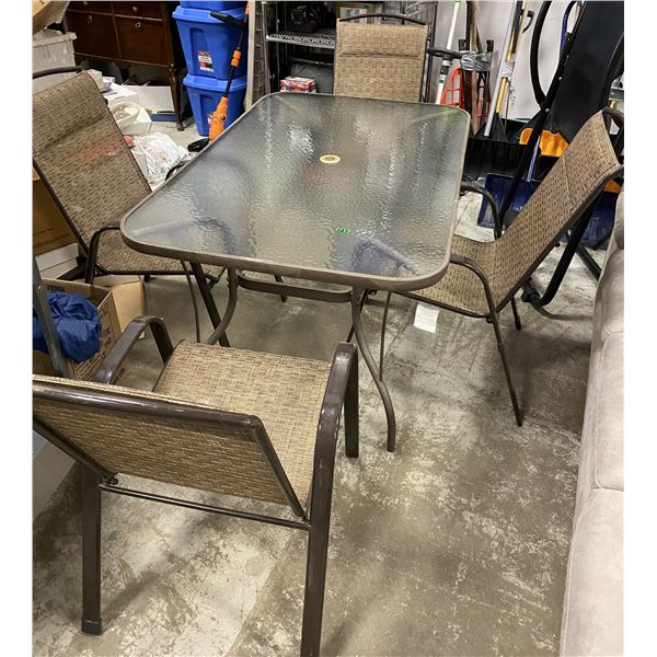 Patio table with 4 matching chairs and chair pads