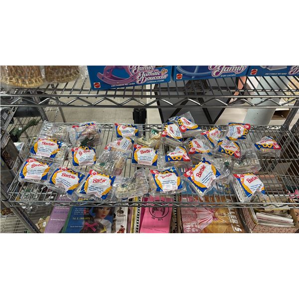 SHELF OF ASSORTED MCDONALDS BARBIE TOYS