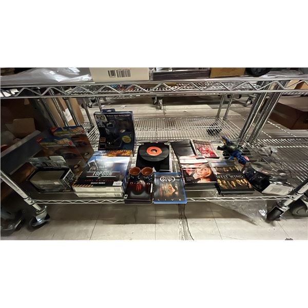 SHELF OF ASSORTED ITEMS INCLUDING; TOP GUN VIDEO GAME, HOT WHEELS SOJOURNER MARS ROVER, DVD'S &