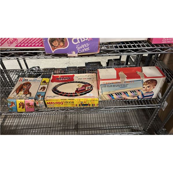 SHELF OF ASSORTED VINTAGE TOYS