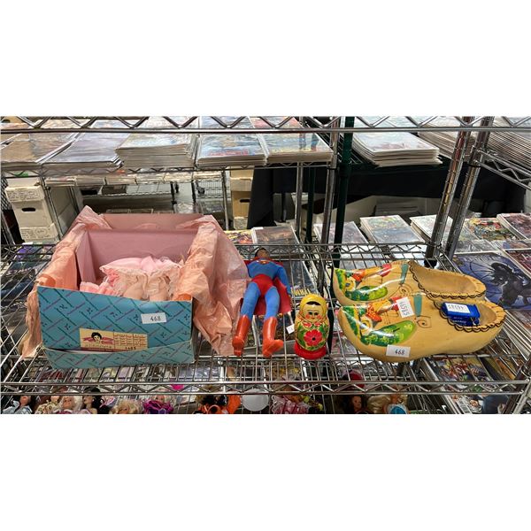 SHELF OF ASSORTED ITEMS INCLUDING; DOLLS, RUSSIAN NESTING DOLLS, KLOMPEN SHOES & MORE