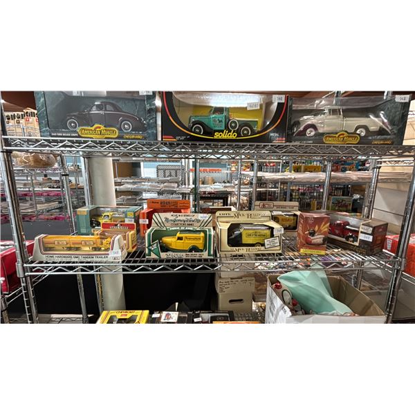 SHELF OF ASSORTED DIE CAST SCALE MODEL VEHICLES: 4 ARE BANKS *2 BOXES ARE EMPTY*