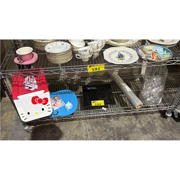 ROLL OF CLEAR CELLOPHANE, BIN OF CLEAR ORNAMENTS, HELLO KITTY STORAGE BIN & MORE
