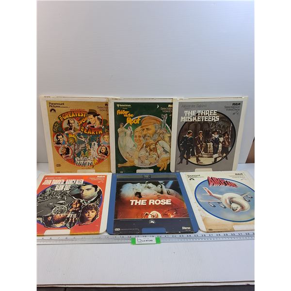 (6) Vintage Video Discs: John Travolta, Airplane, Three Muskateers