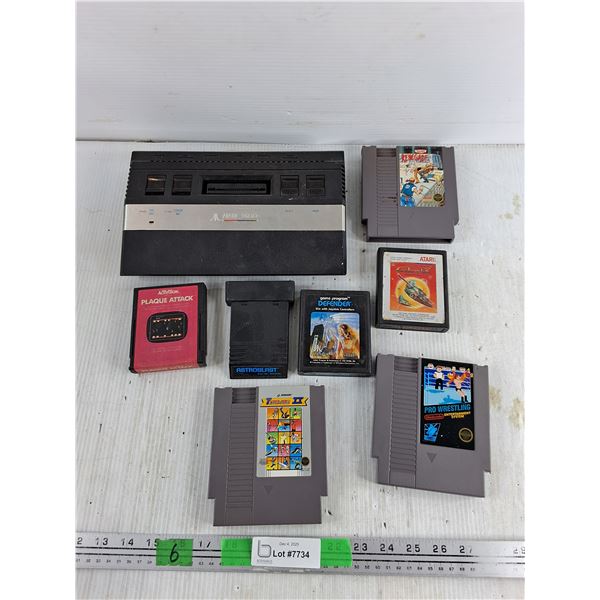 Atari 2600 Gaming Console - As Is, Nintendo & Atari Game Cartridges - Pro Wrestling, Defender, Misc