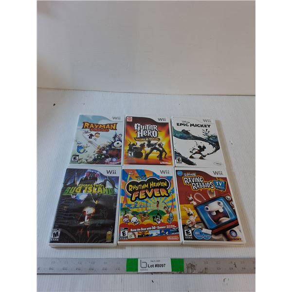 (6) Wii Games: Rayman, Guitar Hero, Epic Mickey, Escape from Bugland, Rhythm Heaven, Ravmam