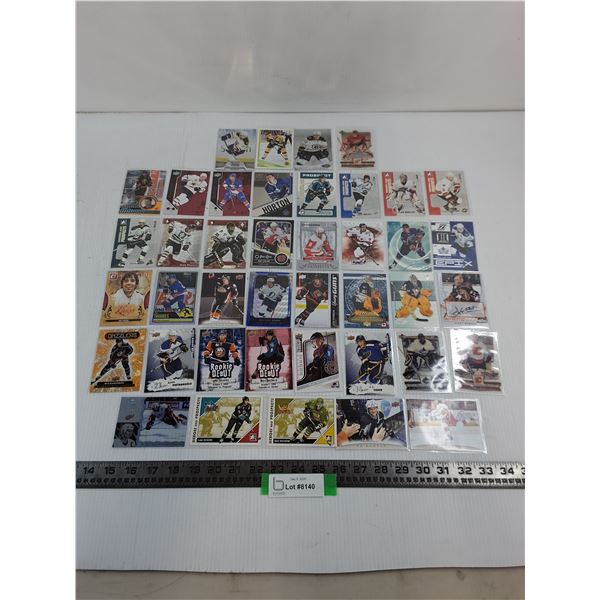 (41) Assorted NHL/AHL/CHL Sleeved Collector Cards - Authenticity Not Guaranteed