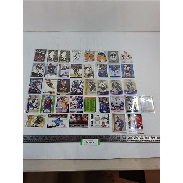 (39) Assorted NHL/CHL Sleeved Collector Cards - Authenticity Not Guaranteed