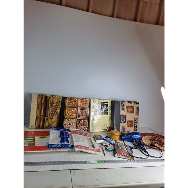 (5) Photo albums, (2)Plastic Cutting Boards,(2) Garment Bags,Blow Dryer (powers on),  Misc -PICK UP