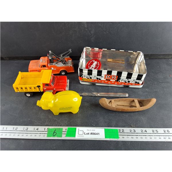 Toy Trucks, Scalpel, Carved Wood Boat, Piggy Coin Bank, Misc