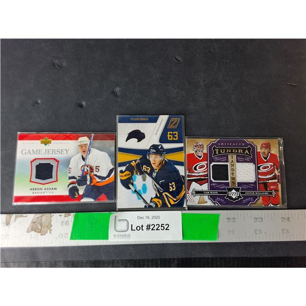 (3) NHL Cards with Jersey Material- Aaron Asham, Tyler Ennis, Cam Ward. Cannot Authenticate