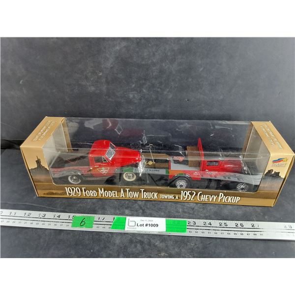 Die Cast 1929 Ford Model A Tow Truck towing a 1952 Chevy Pickup