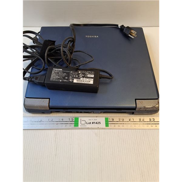 Toshiba Laptop (Blue) as is.No hard drive,has charger