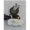 Image 4 : (4) TV Remotes, Las Vegas Coin Bank, Grocery Cart Wheel, Video Game Controller