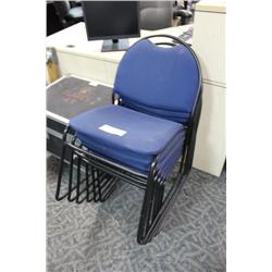 Stack Of Blue Stacking Chairs