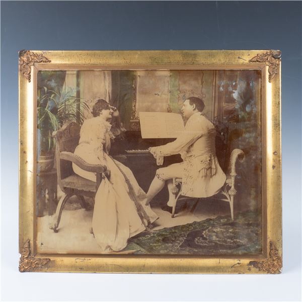 Vintage Photograph of a Man and Woman in Front of a Piano