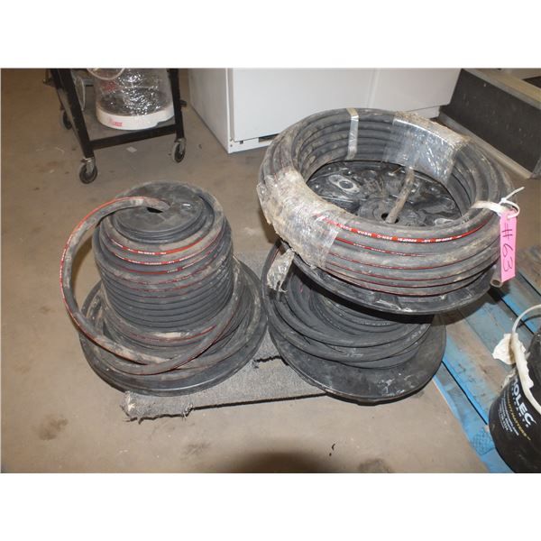 Two Partial Rolls Of Hydraulic Hose