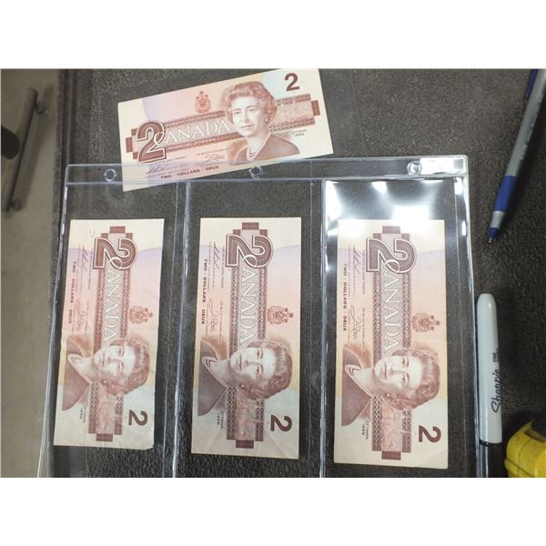 Four 1986 Canadian Two Dollar Bills