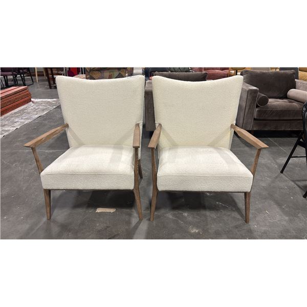PAIR OF WHITE WING BACK ARMCHAIRS WITH WOODEN LEGS