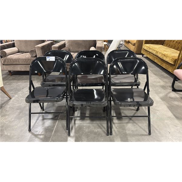 SIX BLACK METAL FOLDING CHAIRS