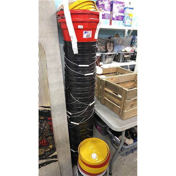 LARGE STACK OF BUCKETS WITH SOME LIDS