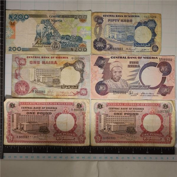 6-NIGERIA BILLS: 2-ONE POUND BILLS, 1 NAIRA, 5
