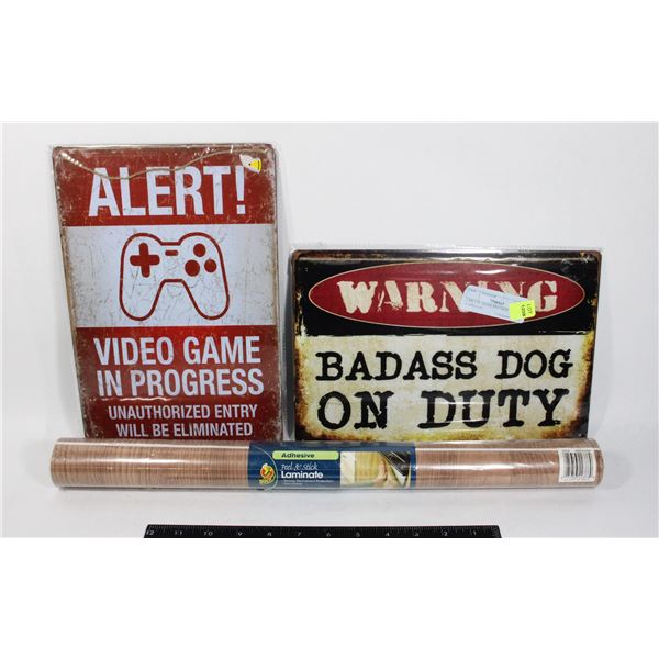 2 METAL SIGNS AND NEW ROLL OF LAMINATE