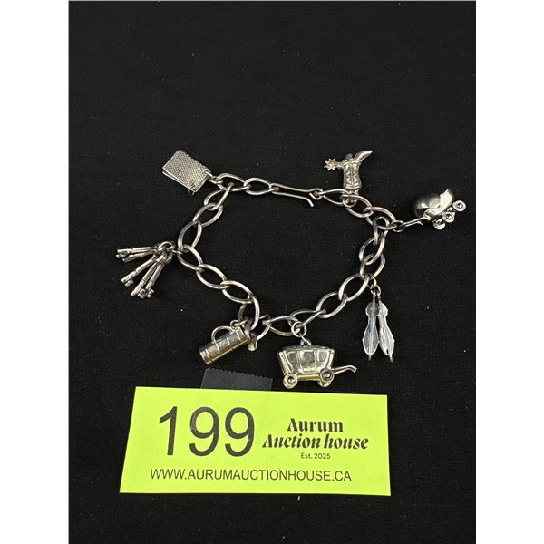 Vintage 925 Sterling Silver Link Charm Bracelet and 7 Sterling Charms - 21.44 Grams - Marked Sterlin