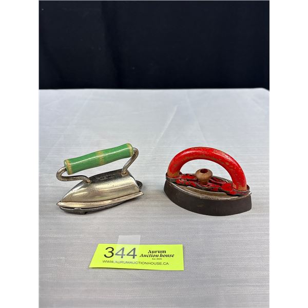 2 Antique Kids Sad Irons 1 Has a Trivet