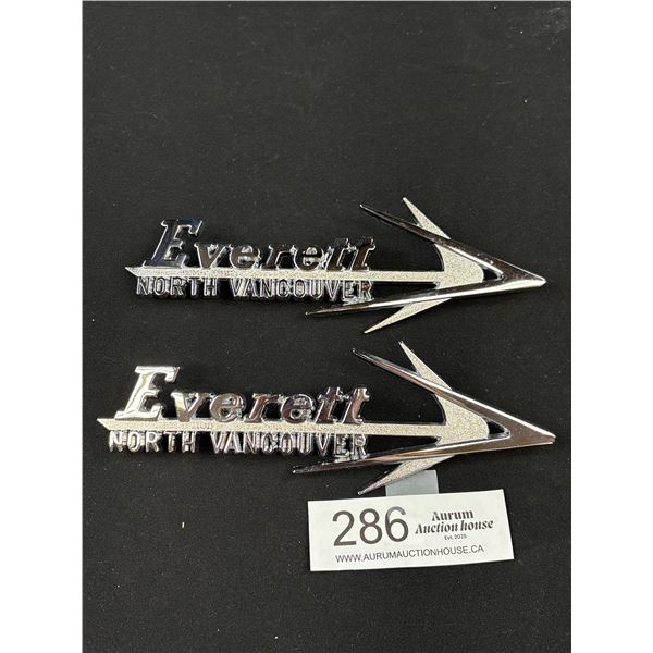 Pair of 1950s  Everett  Motors Chrome Medal Decals