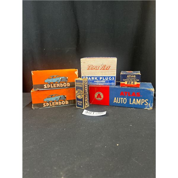 Lot of Automotive Lamp Boxes Mostly Full and Spark Plugs