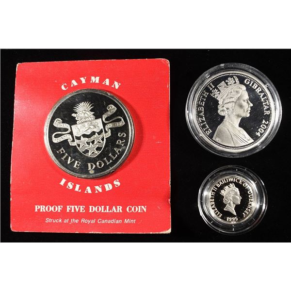 3 FOREIGN STERLING SILVER COINS