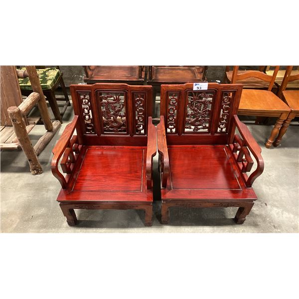 PAIR OF HEAVILY CARVED HARDWOOD ASIAN ARMCHAIRS