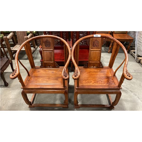 PAIR OF CARVED HARDWOOD ASIAN ARM CHAIRS