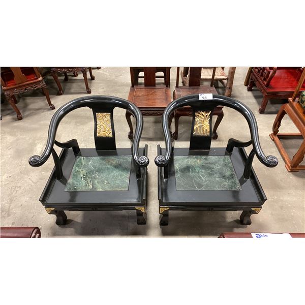 PAIR OF CARVED HARDWOOD BLACK/GOLD ASIAN ARM CHAIRS, COMES WITH GREEN CUSHIONS