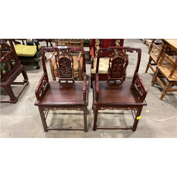 PAIR OF HEAVILY CARVED HARDWOOD ASIAN ARMCHAIRS
