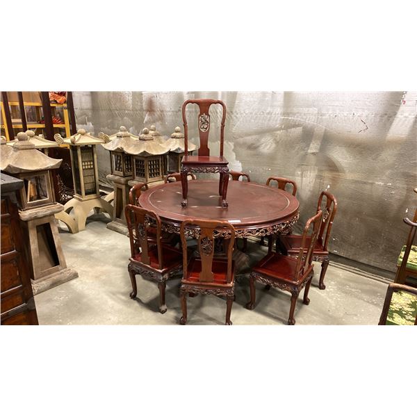 HEAVILY CARVED HARDWOOD ASIAN DINING TABLE WITH 9 SIDE CHAIRS